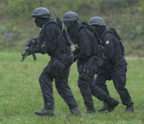 SWAT team in action used as inspiration for airsoft loadout