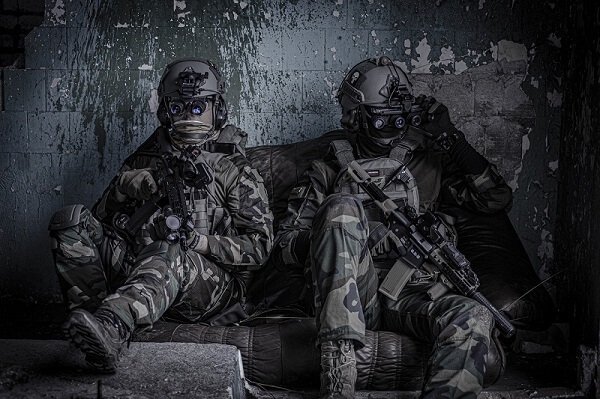 Airsoft players resting on the bench